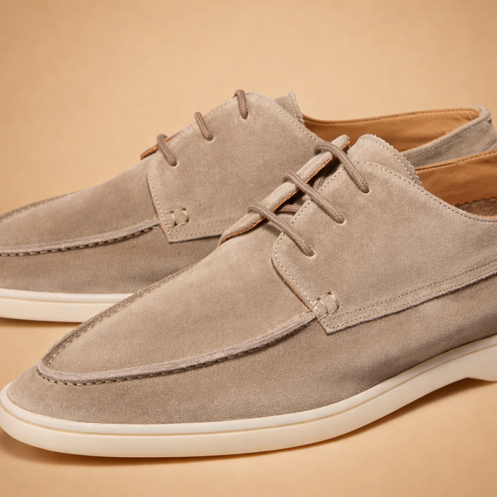 Close-up of men's slip-on loafers, highlighting quality material and elegant design for refined style.