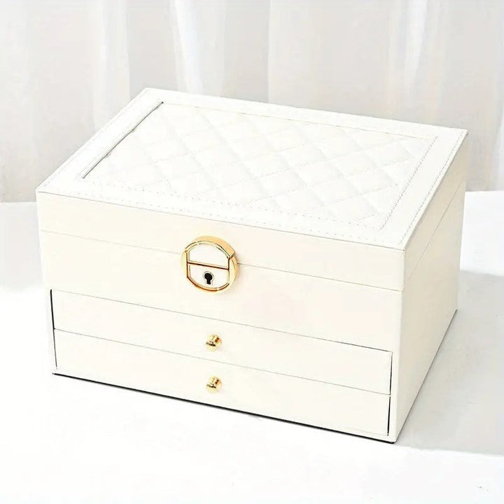 White leather multilayer jewelry organizer, stylish accessory box for vanity or dresser.