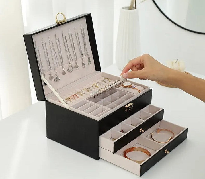 Luxury multilayer storage box, elegant leather organizer for women's jewelry collection.