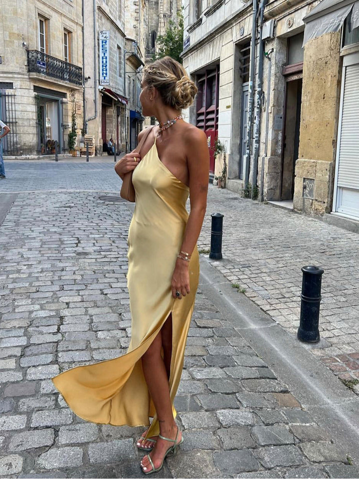 Sophisticated women's long open back maxi dress, ideal as a wedding guest, evening gown, or party dress.