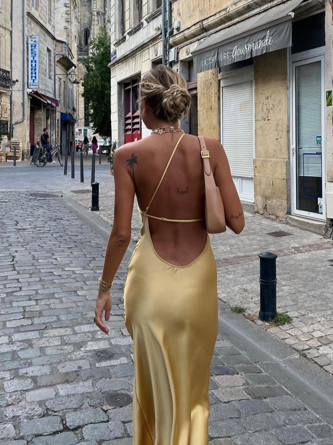 Formal open back maxi dress for women, a graceful choice for special occasions like weddings or galas.