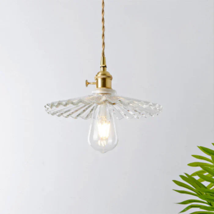 OpulentGlow glass pendant, a sophisticated ceiling fixture for dining spaces.