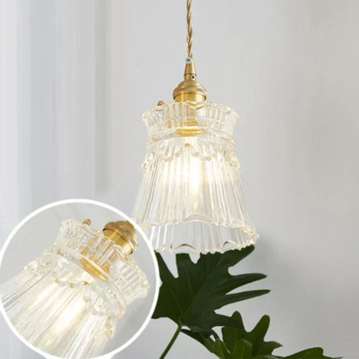 Modern elegant glass hanging lamp, ideal for ambient dining room lighting.