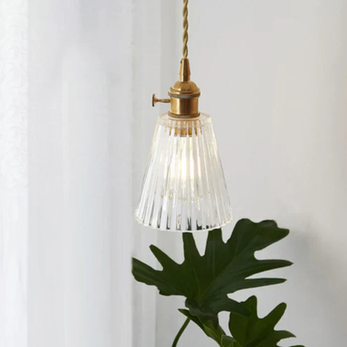 Clear glass pendant light for kitchen, OpulentGlow industrial design.