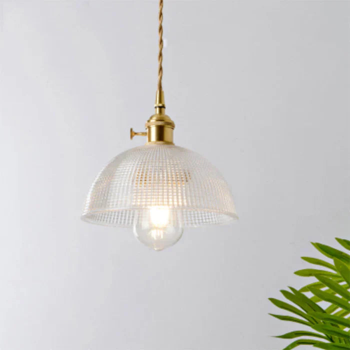 Transparent glass hanging lamp, perfect industrial lighting for kitchens & dining spaces.