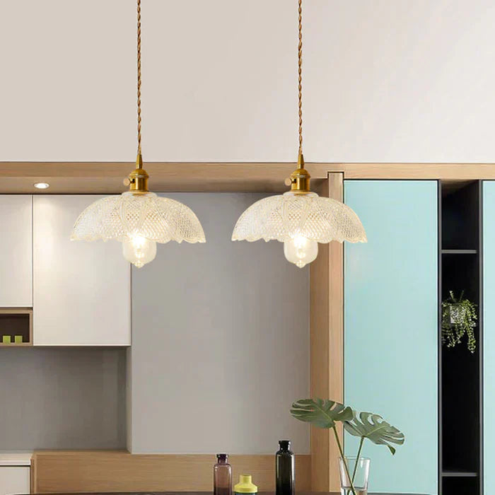 Elegant glass pendant lamp, OpulentGlow design for sophisticated dining spaces.
