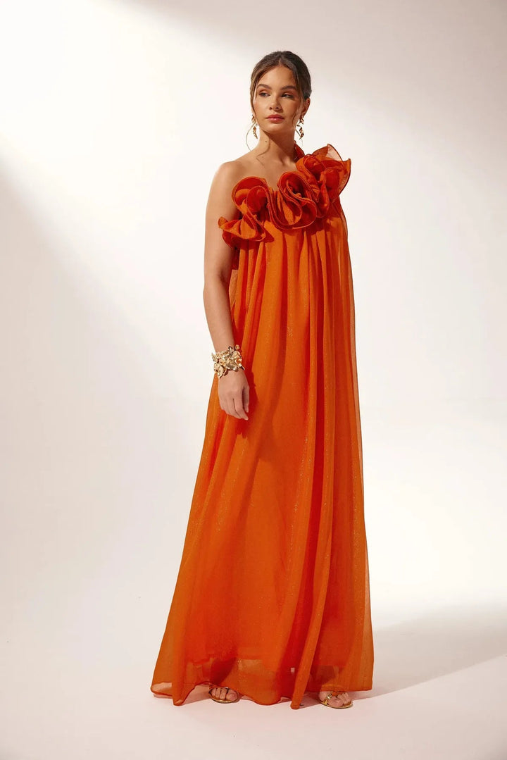 Vibrant orange asymmetric one-shoulder maxi dress with beautiful floral patterns, a statement piece for women.