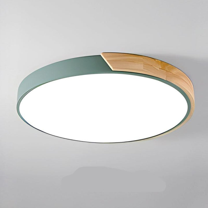 "Elegant Scandinavian Circular LED Ceiling Light Fixture with minimalist design, warm glow, and wood finish option."