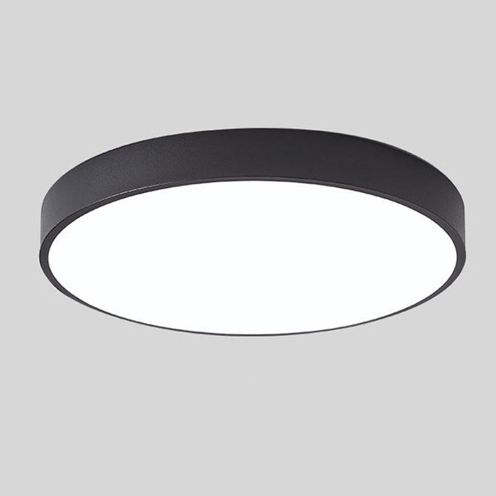 "Elegant Scandinavian Circular LED Ceiling Light Fixture with minimalist design, warm glow, and wood finish option."
