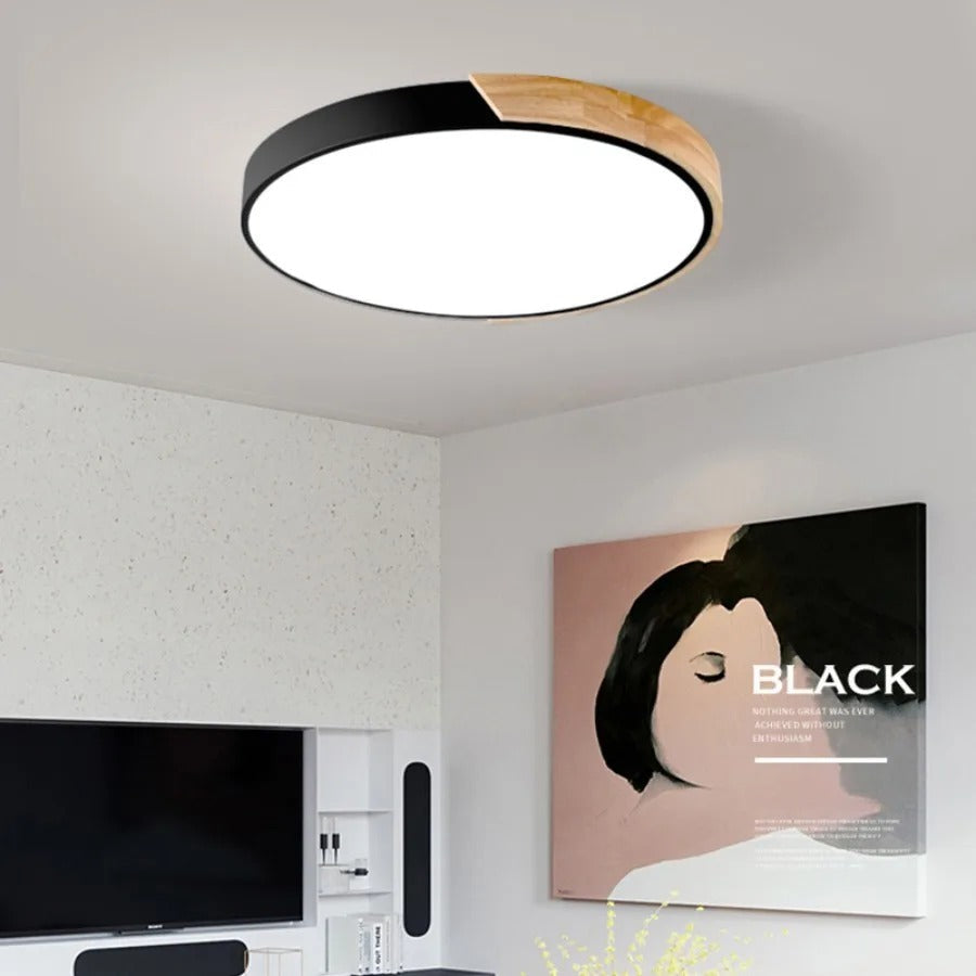 "Elegant Scandinavian Circular LED Ceiling Light Fixture with minimalist design, warm glow, and wood finish option."
