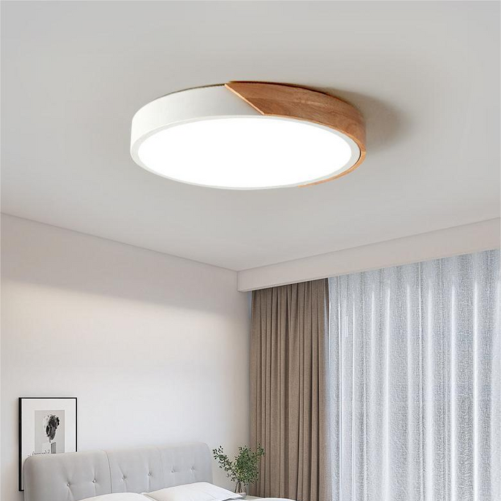 "Elegant Scandinavian Circular LED Ceiling Light Fixture with minimalist design, warm glow, and wood finish option."