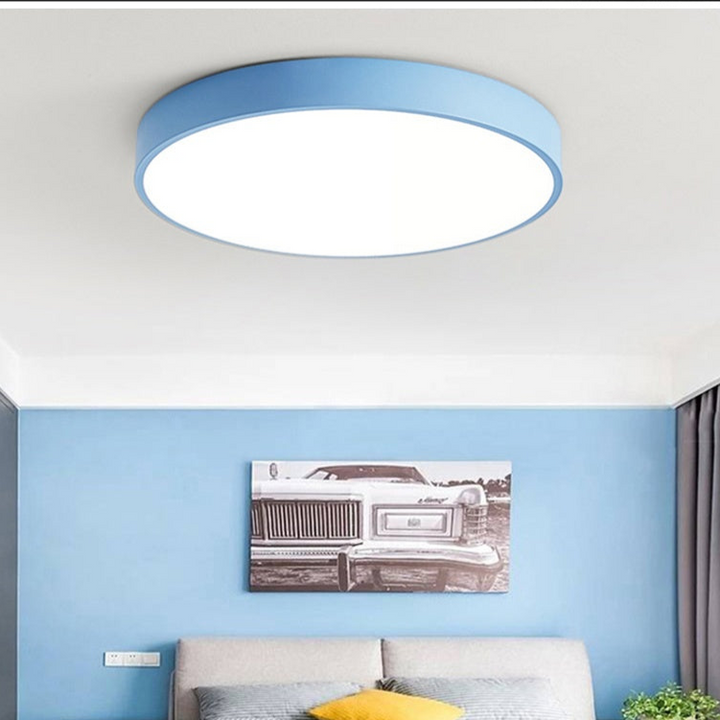 "Elegant Scandinavian Circular LED Ceiling Light Fixture with minimalist design, warm glow, and wood finish option."