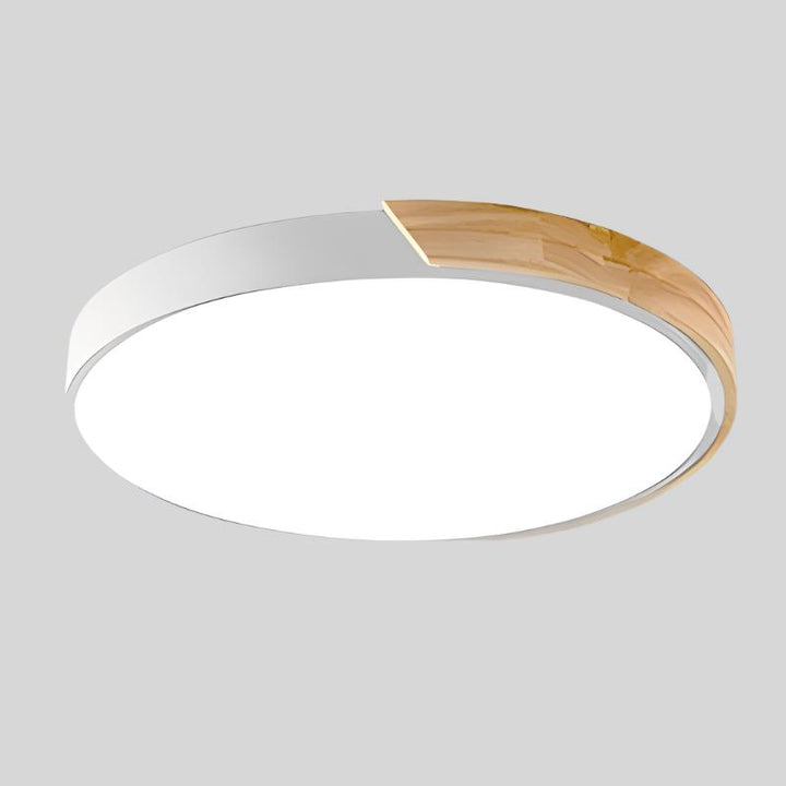 "Elegant Scandinavian Circular LED Ceiling Light Fixture with minimalist design, warm glow, and wood finish option."