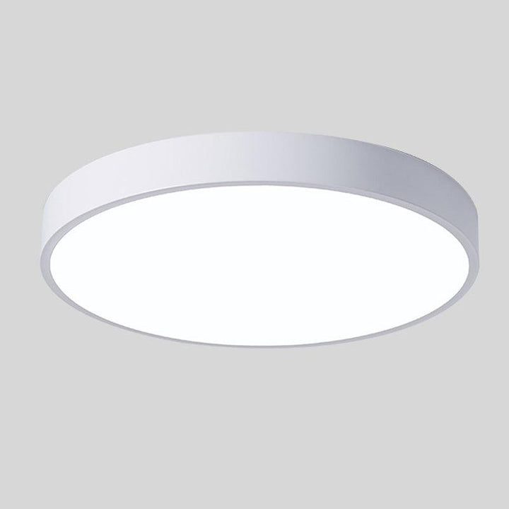 "Elegant Scandinavian Circular LED Ceiling Light Fixture with minimalist design, warm glow, and wood finish option."
