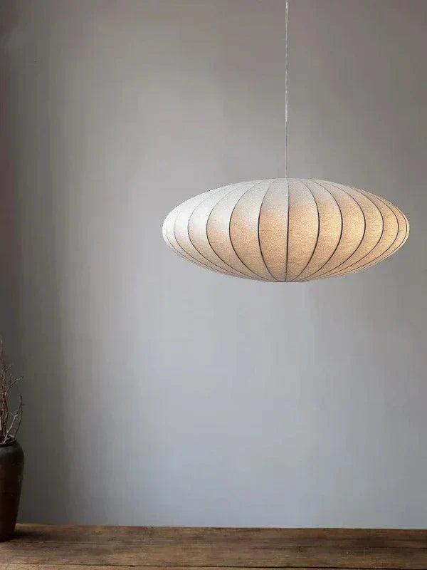 Elegant silk shade pendant light with sparkling crystal details, luxury hanging lamp for modern home decor.
