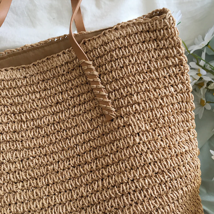 Chic white TerraWoven women's shoulder handbag. Spacious woven design, durable & versatile for daily use.