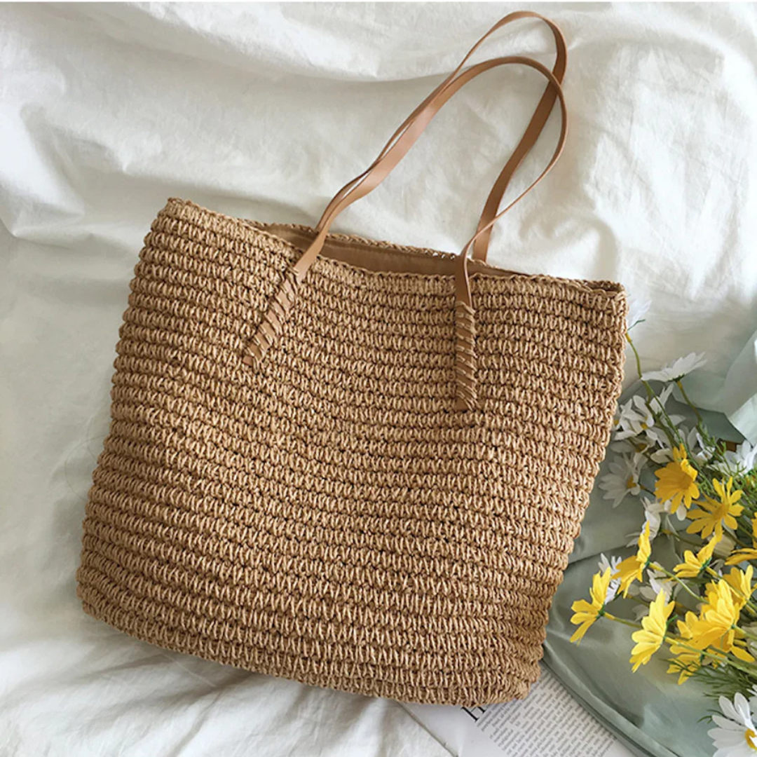 Close-up of the elegant woven texture of a TerraWoven women's shoulder bag, highlighting durability.