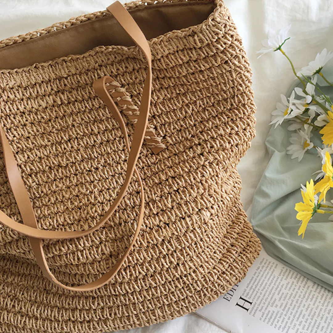 Woman carrying a spacious brown TerraWoven shoulder bag, an elegant & versatile daily fashion accessory.