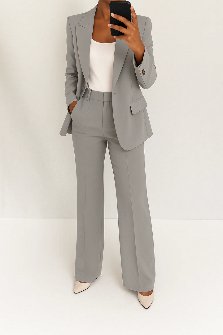 Professional women's business suit. Stylish two-piece set for career & formal wear.