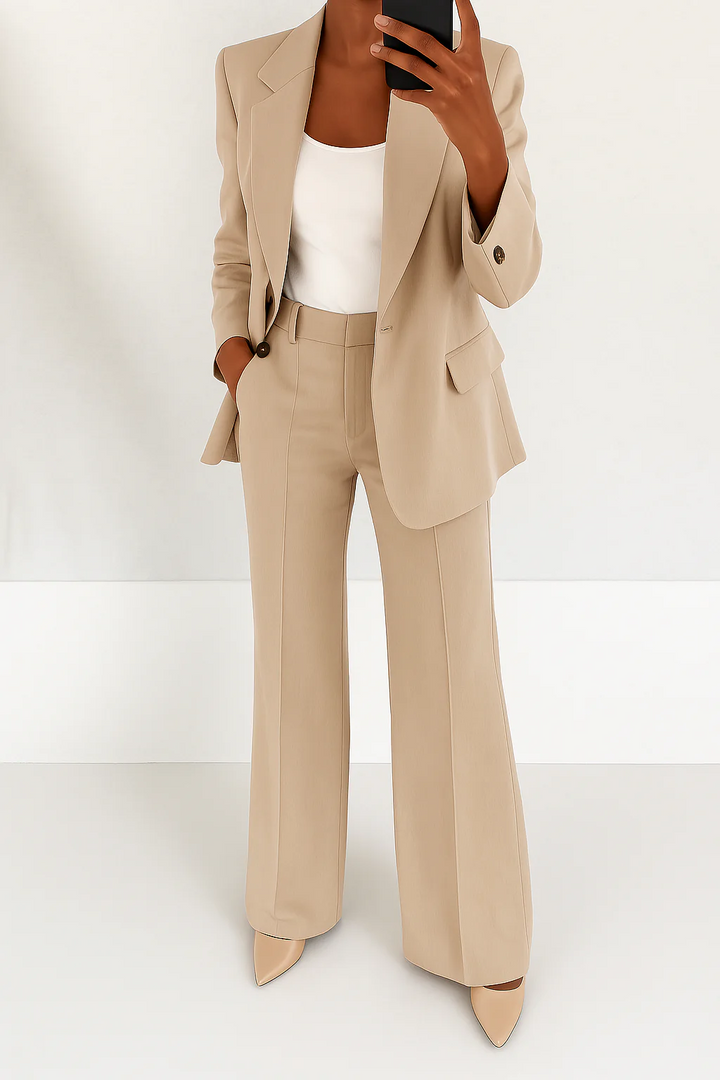 Versatile two-piece formal suit for women. Elegant business attire & professional fashion.