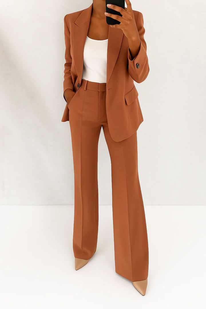 Chic women's career suit. Fashionable two-piece set, ideal for professional & formal wear.