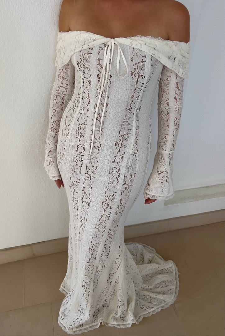 Women's fashion: elegant white off-shoulder maxi dress for formal events and party wear.