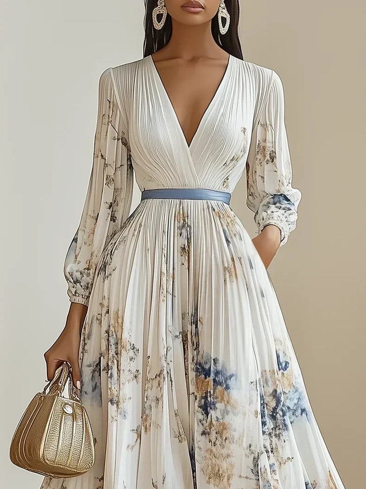 Women's sophisticated long white maxi dress featuring a stylish V-neck and chic puff sleeves.