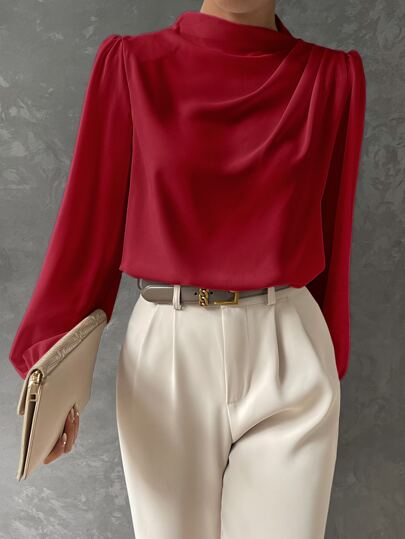 Modern yet classic women's bishop sleeve blouse, a sophisticated top with an elegant draped neckline.