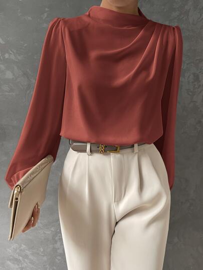Sophisticated women's blouse, perfect for special events or evening wear, with elegant bishop sleeves and draped neck.