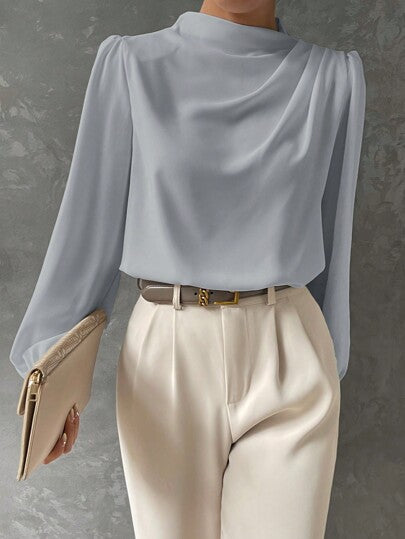 Chic women's elegant blouse, featuring long bishop sleeves and a graceful draped neckline for versatile style.