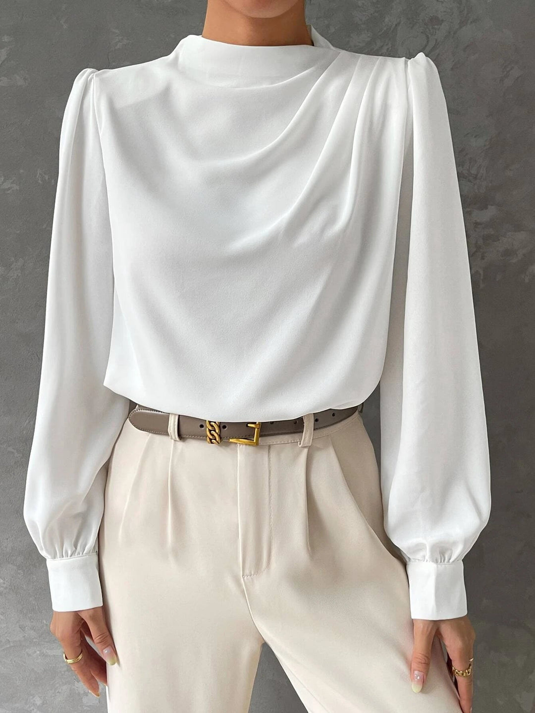 Fashionable women's top featuring a sophisticated draped neckline and elegant bishop sleeves, a chic versatile blouse.
