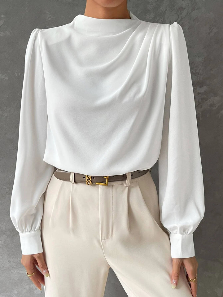 Fashionable women's top featuring a sophisticated draped neckline and elegant bishop sleeves, a chic versatile blouse.