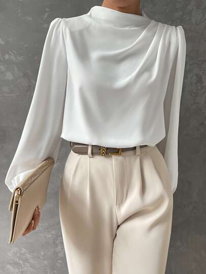Flowy women's bishop sleeve blouse, an elegant fashion top with a soft draped neckline, perfect for office or evening.