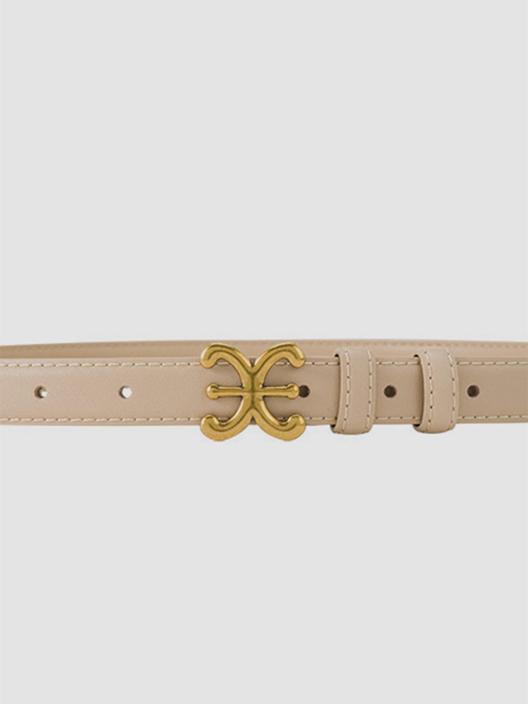Stylish women's black leather waist belt, designed with an elegant sculpted buckle to cinch your favorite dress.