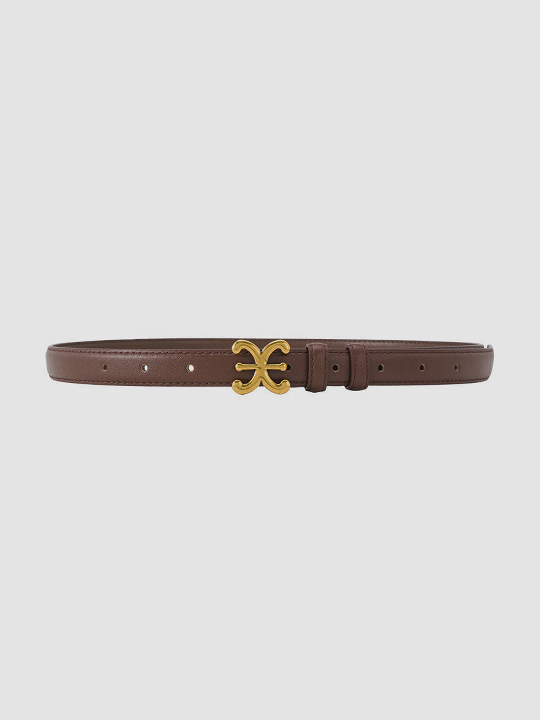 Women's elegant beige leather waist belt, showcasing a distinctive sculpted buckle. Elevates any outfit or dress.