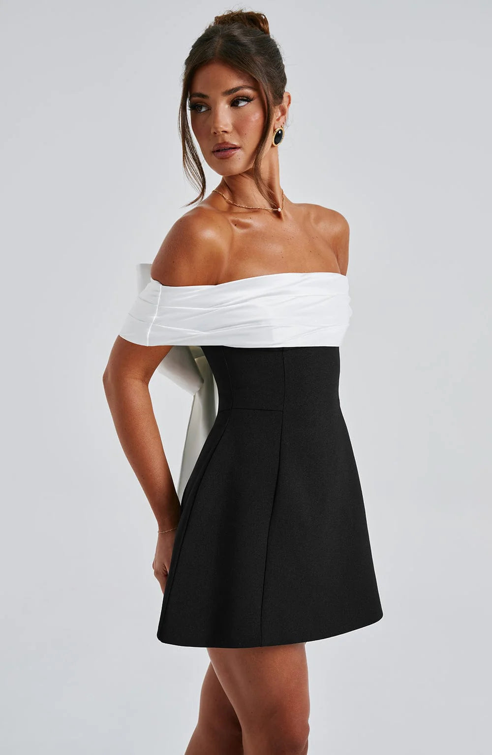 Glamorous black bubble skirt mini dress, a perfect women's party or cocktail outfit for evenings.
