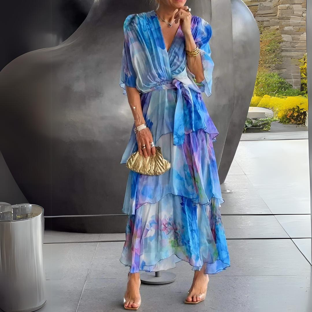 Elegant women's blue V-neck dress, flattering silhouette for parties or formal events. Stylish & comfortable.