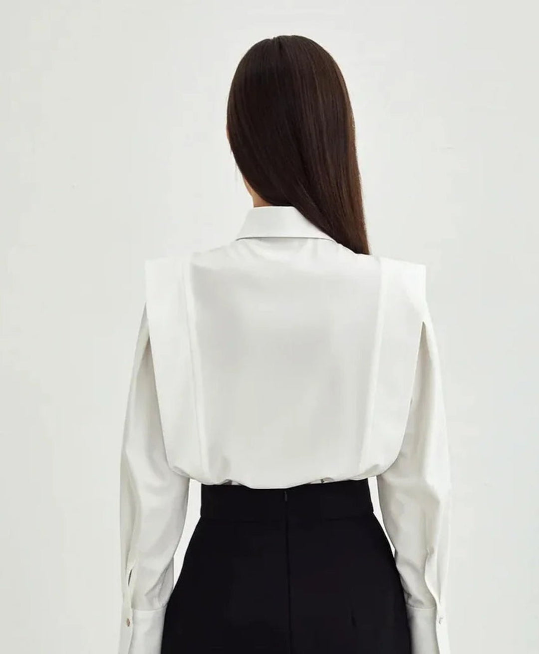 Versatile women's square button-down shirt; a chic long-sleeve blouse for casual or office elegance.