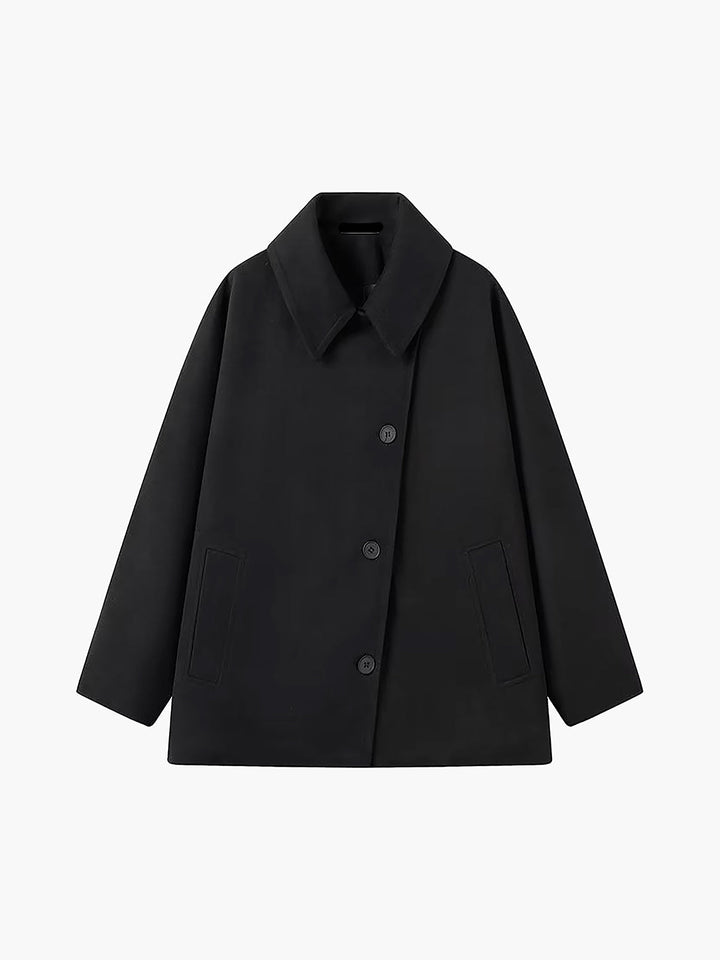 Women's classic lapel overcoat, a timeless and elegant piece of outerwear. Ideal for sophisticated autumn & winter looks.