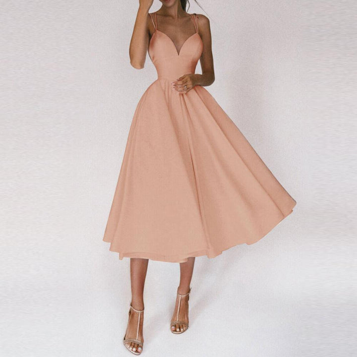 Chic women's elegant midi dress. Classy formal wear, ideal for special occasions, cocktail parties, and events.