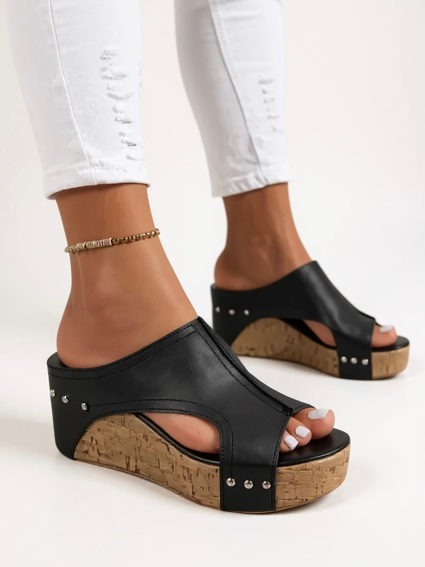 Stylish slip-on wedge sandals for women, offering comfort and support for daily wear.