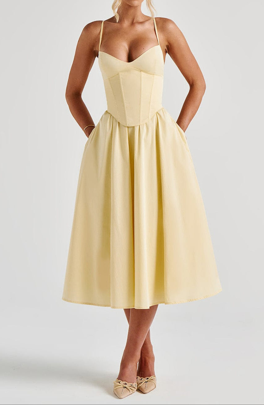 Women's elegant spaghetti strap corset midi dress with a flowing A-line skirt, perfect for formal wear.