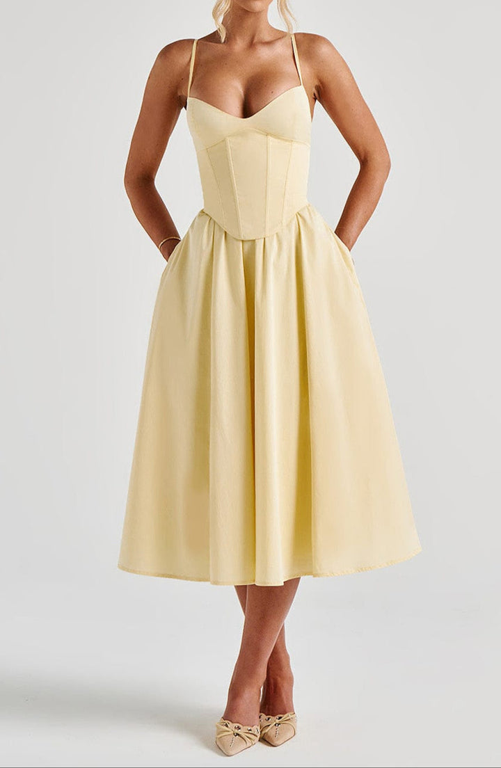 Women's elegant spaghetti strap corset midi dress with a flowing A-line skirt, perfect for formal wear.