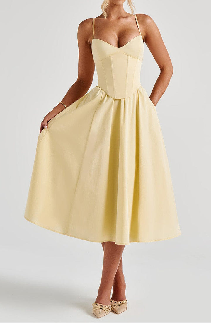 Sophisticated wedding guest dress: women's elegant corset midi with A-line skirt & spaghetti straps.