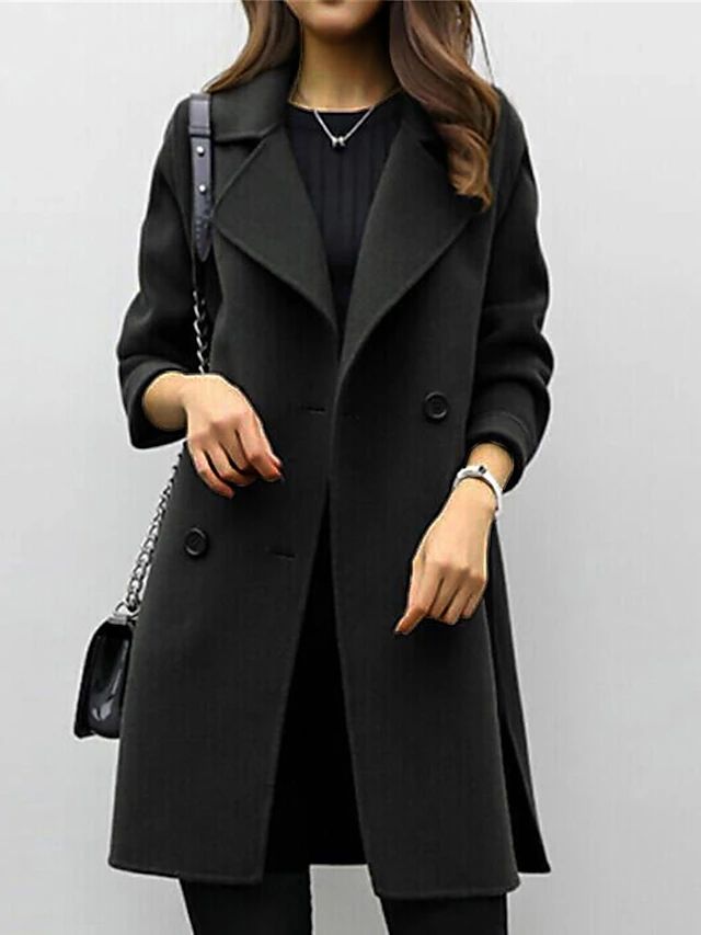 Stylish women's double-breasted long trench coat featuring a prominent lapel. Ideal autumn/spring outerwear.