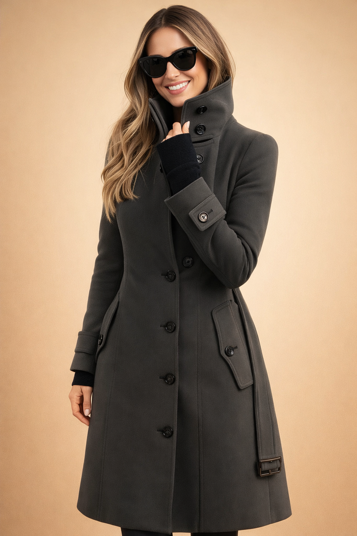 Fashionable women's double-breasted long winter coat, an elegant structured outerwear piece for women.