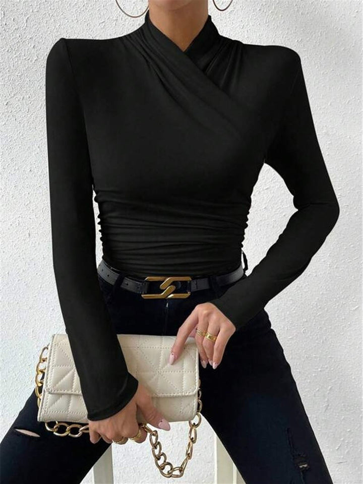Flattering women's draped crossover long sleeve top, an elegant solid color wardrobe essential for any occasion.