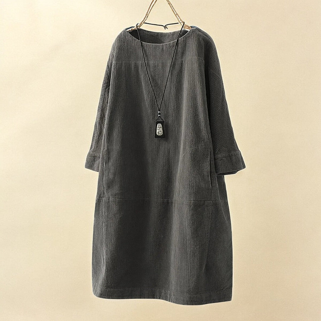 Flattering women's draped dress, elegant and comfortable with tummy control silhouette.