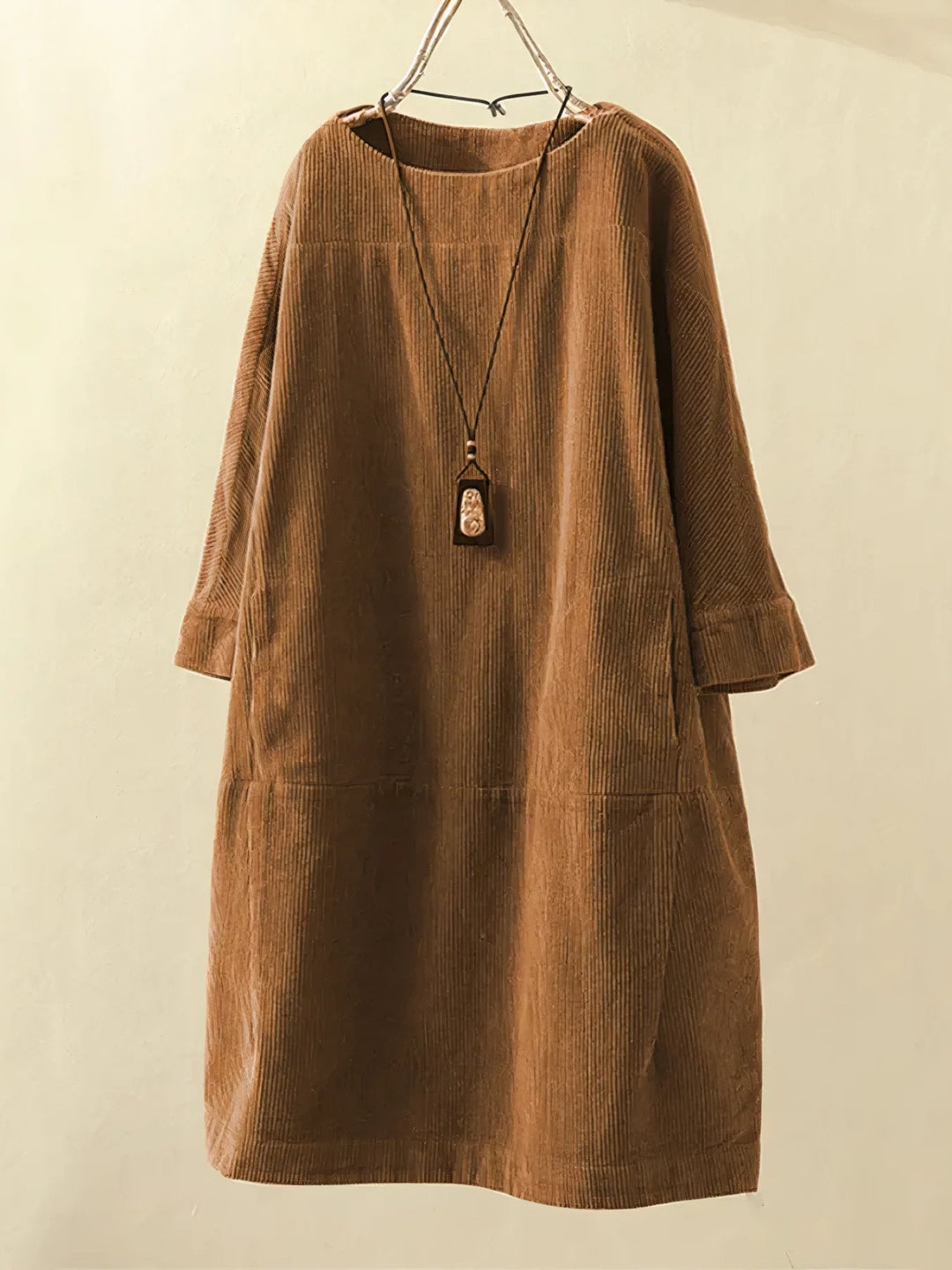 Flowy draped dress for women, elegant, tummy flattering, comfortable for casual or dressy wear.