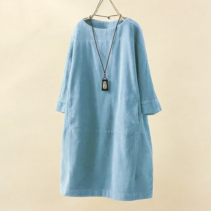 Comfortable women's flowy draped dress, elegant design, perfect for everyday wear.